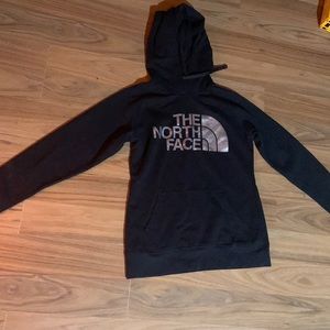 Black north face hoodie barely  worn used no stains willing to take offers